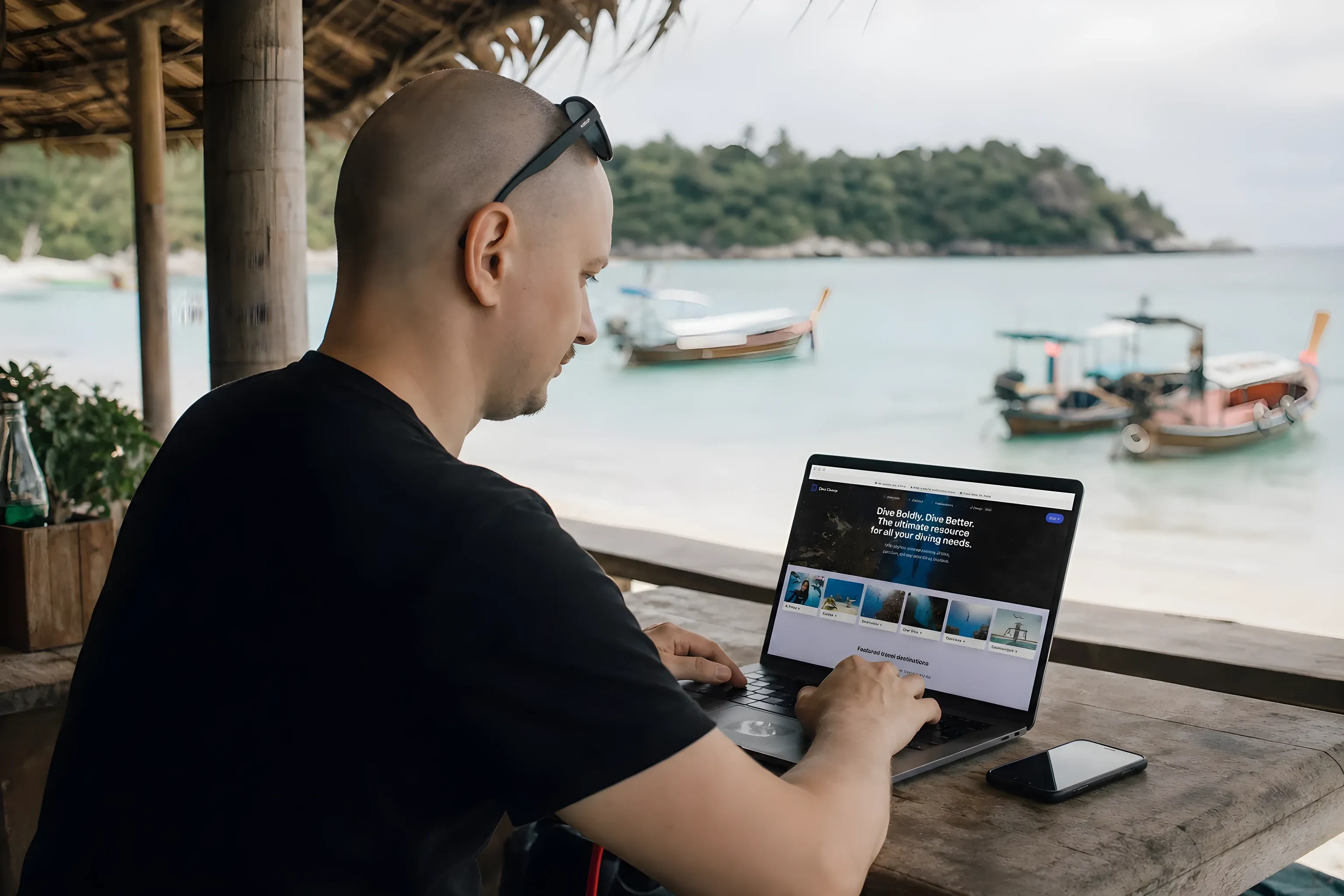 Simon working on DiveChamp from a beach bar on a Thai island