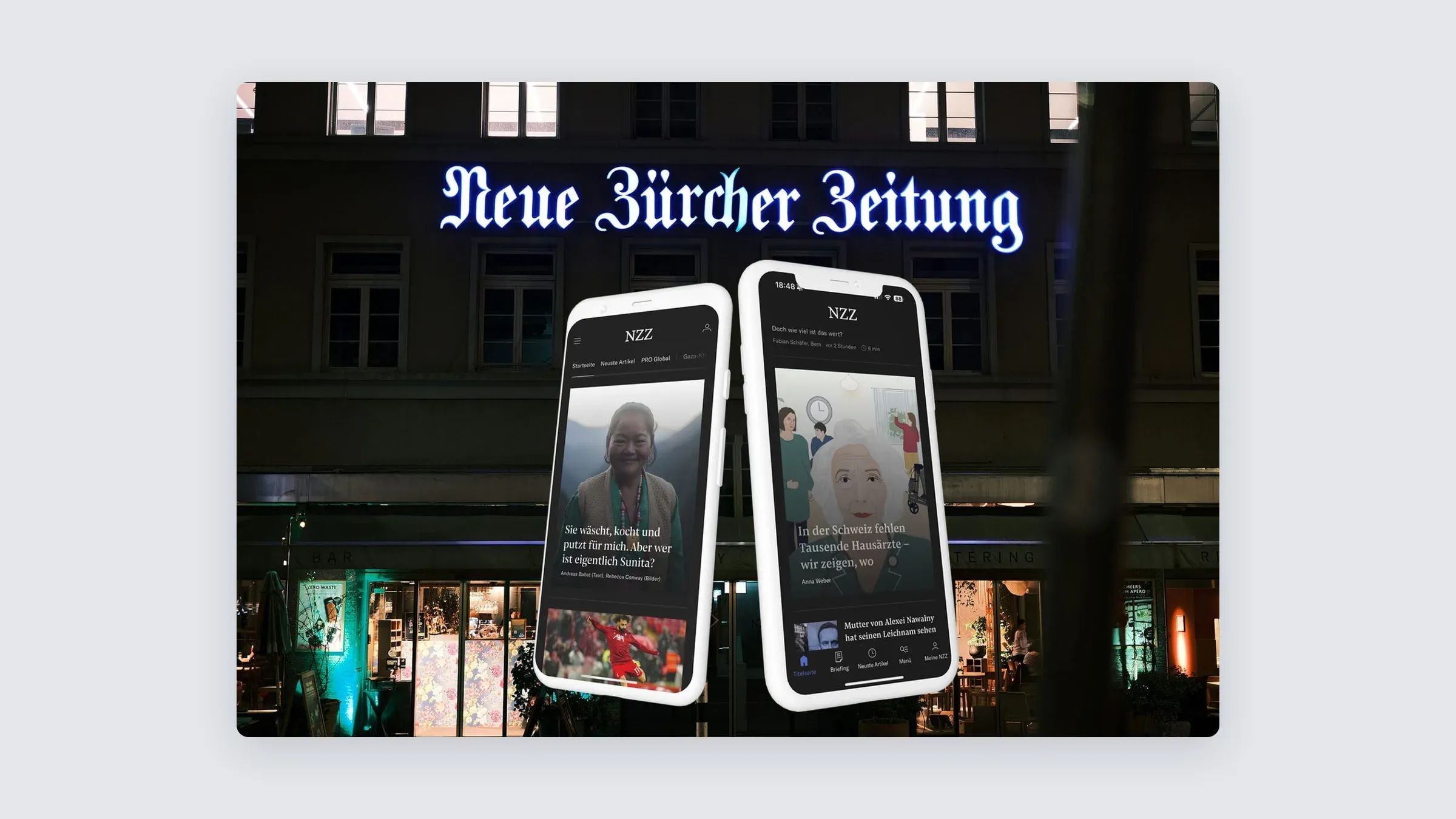 The new NZZ front page on two phones in front of the NZZ building at night